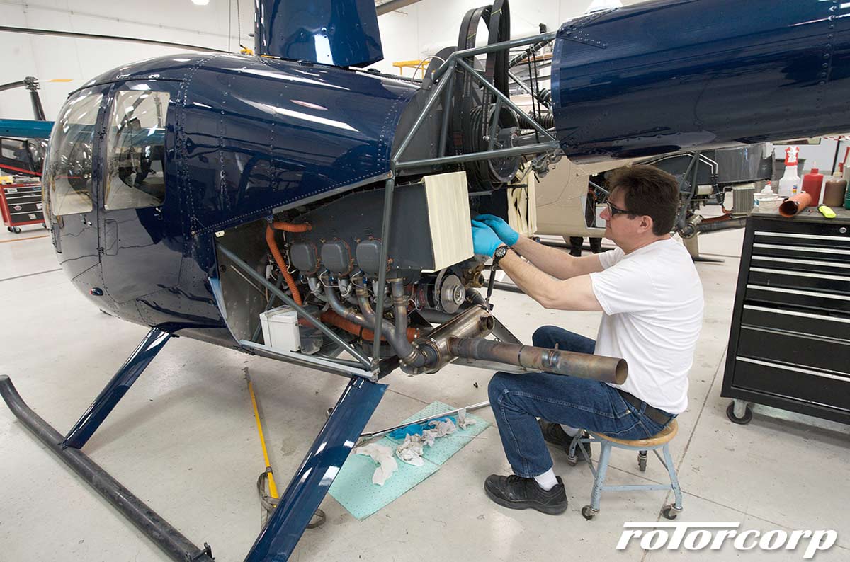 Mechanic working on a Robinson Helicopter R44